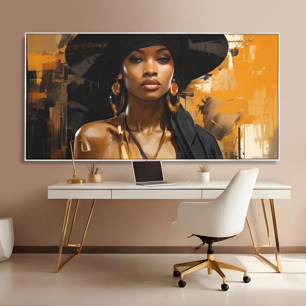 Tablou canvas cu tablou canvas cu femeie in palarie neagra, in rama de aluminiu argintiu, pe perete intr-un birou